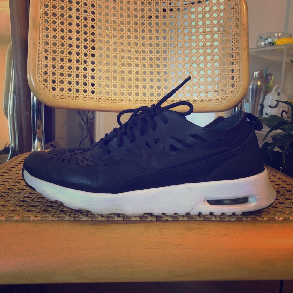 Nike Black leather Thea, with Laser cut designs